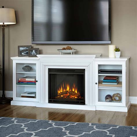 It's paired with a fan, a faux fireplace, and attractive faux walnut sidinga heater that will look good in any space. . Best electric fireplace
